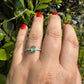 Anel Com Cristal Oval Central Laterais Zircônias Prata925