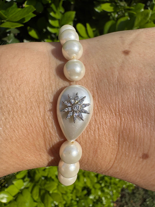 Pulseira Pérola Shell Com Detalhe Estrela De Zirconias